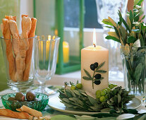 Olea (olive), wreath with candle and bouquet, bowl with olives