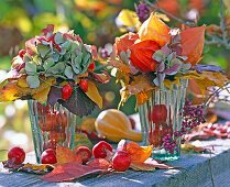 Bouquets of foliage, hydrangea, lanterns and rosehips