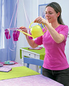 Hanging table top in pink bottles