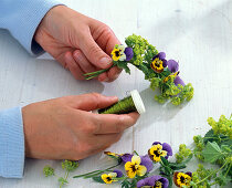 Viola lady's mantle wreath around lantern (1/3)