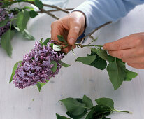 Bouquet of lilacs in glass vase with lilies (1/4)