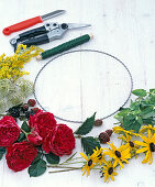 Wreath with red roses and Rudbeckia (1/3)