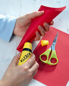 Make red bags for Santa Claus