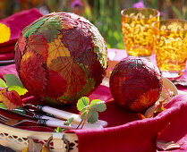 Balls with autumn strawberries leaves