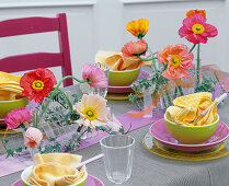 Table arrangement of silk poppies in wire mesh (5/5)