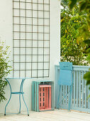 Before-and-after balcony with steel lattice: summer aspect