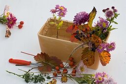 Autumn arrangement in ceramic jardiniere