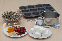 Homemade bird food in muffin baking dish