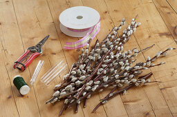 Anemone flower in a standing bouquet of pussy willow