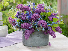 Fragrant spring bouquet from Syringa, Aquilegia