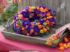 Wreath of summer asters and lampion flower