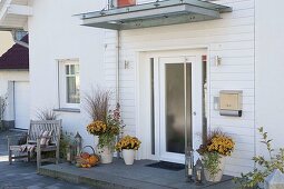 White front door with granite landing