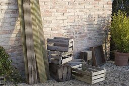 Potting area made from old wine crates and boards (2/5)