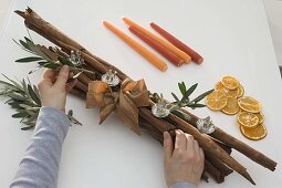 Unusual Advent arrangement made from cinnamon sticks (4/5)