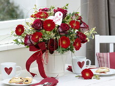Bouquet with red Rosa 'Nicola', Gerbera 'Germin Grappa'