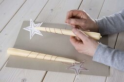 Candleholders decorated with homemade stars 4/5