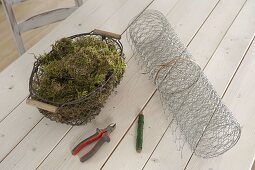 Santa's boot made of chicken wire and moss