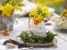 Daffodils Easter table decoration on the terrace