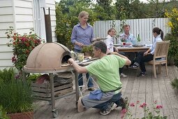 Pizza party on wood terrace