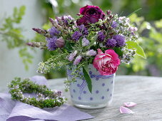 Herb bouquet of Rosa (roses), chive flowers
