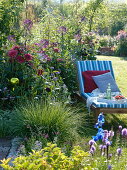 Summer bed with dahlias and roseballs