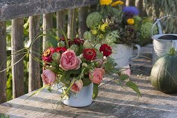 Small bouquet of Rosa (roses), Zinnia (zinnias), Nigella