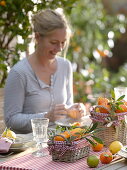 Table decoration with citrus fruits and olives