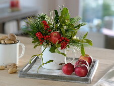 Winter bouquet of Pinus (pine), Viscum album (mistletoe), Ilex (holly)