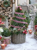 Rustic Christmas terrace with firewood pile