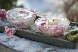 Homemade ice wind lights with rose petals