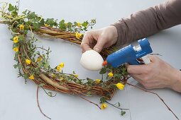 Egg made of willow as Easter door decoration (6/7)