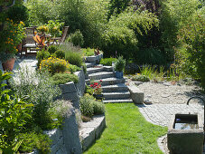 Hillside garden with granite wall terraced