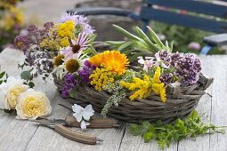Ingredients for medicinal and tea-herb bouquet in basket
