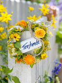 White and yellow wreath of herbs and medicinal herbs