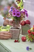 Small bouquet of Aster (white wood aster) and rose (rosehip)