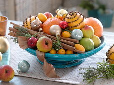 Christmas scented bowl with oranges, spiked with cloves