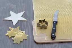 Cutting out beeswax stars (2/3)