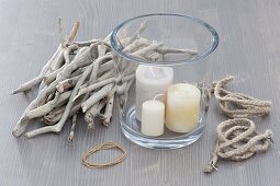 Large glasses with driftwood disguised as lanterns