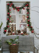 Christmas window decoration with view into the room