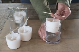 Self-poured candles from candle remnants