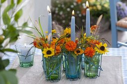 Small bouquets of Rudbeckia (coneflower), Zinnia (zinnias)