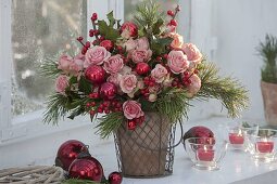 Christmas bouquet with pink (roses), holly (red winterberry)