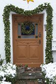 Tying an ivy garland