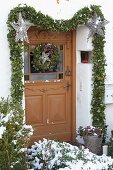 Tying an ivy garland