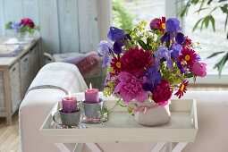 Early summer bouquet of Iris barbata (irises), Paeonia lactiflora