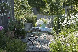 Small sitting area with peony bouquet