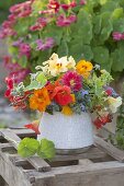 Bouquet of edible flowers and herbs