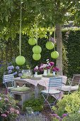 Garden party in early summer under walnut tree