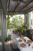 Mediterranean roof terrace with wooden deck