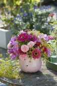 Fragrant bouquet of roses, zinnia and fennel flowers